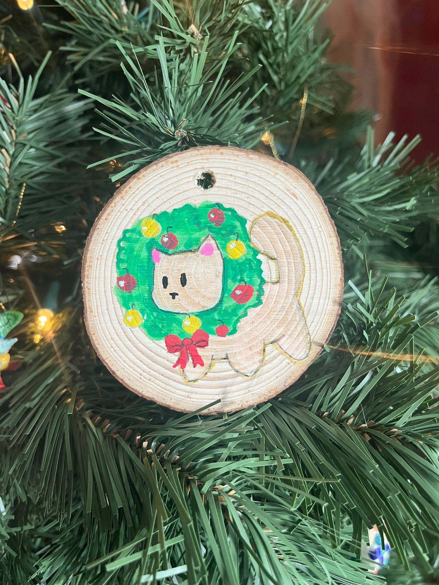 Cat stuck in a wreath, holiday ornament